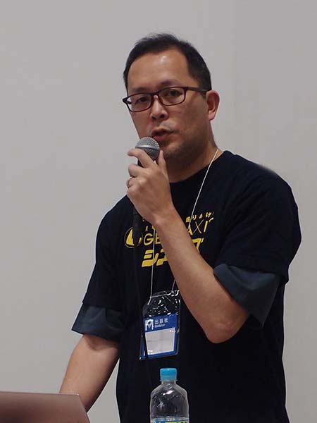 講演した当社の新里隆行